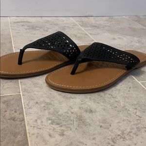 black detailed flip flops